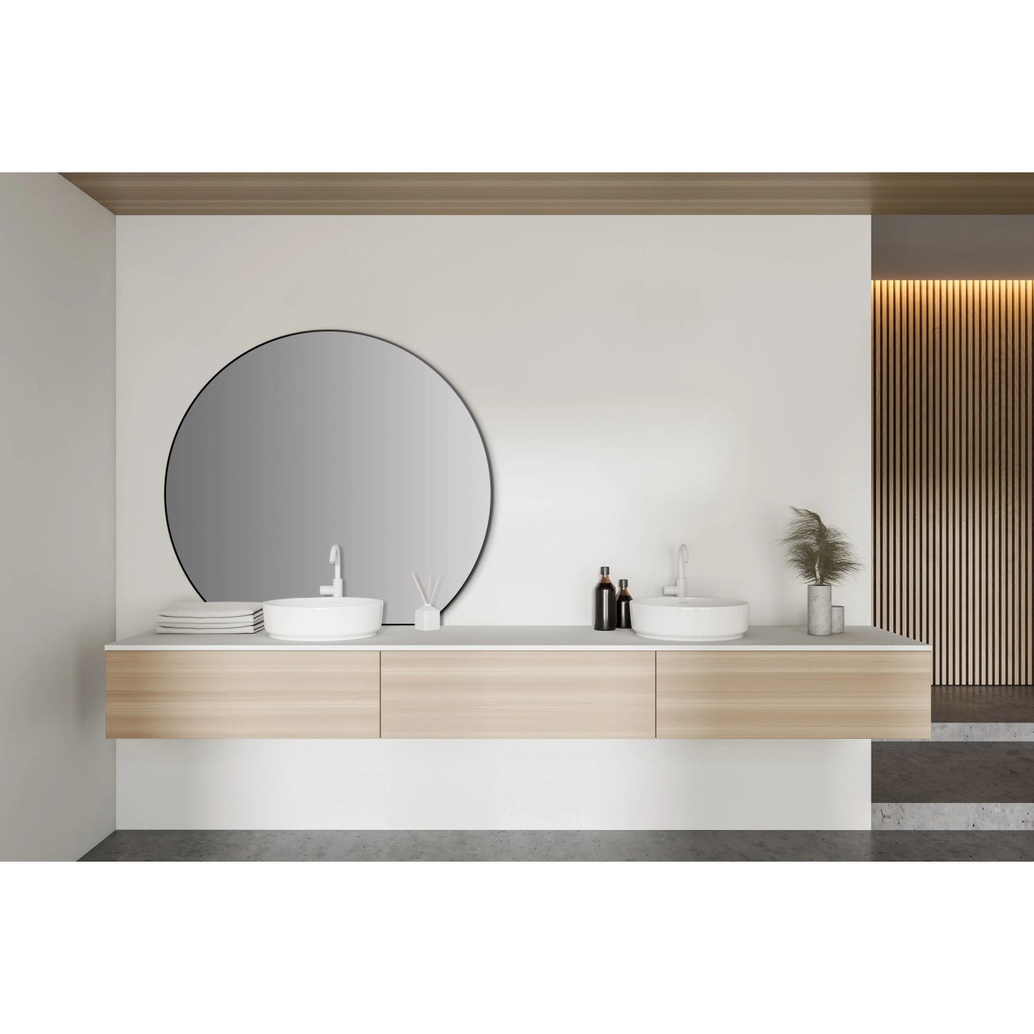 Schwarzer, runder DSK Design-Wandspiegel Picasso, Ø 100 cm, im modernen Badezimmer.