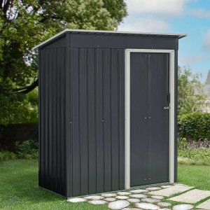 Juskys Metall Gerätehaus S mit Pultdach in Anthrazit im Garten.