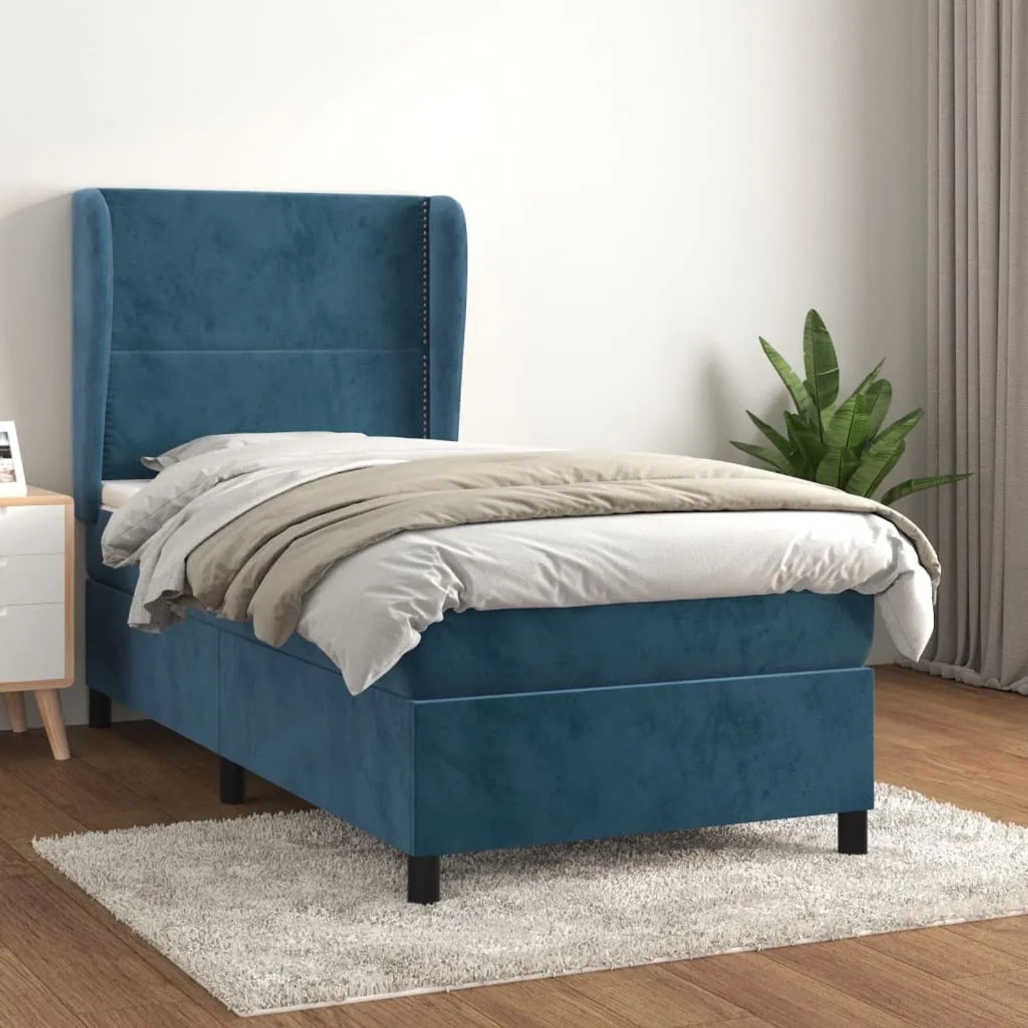 Dunkelblaues vidaXL Boxspringbett (90x200 cm) mit Samtbezug, Matratze und Kopfteil.