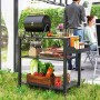 Outsunny Grillwagen aus Stahl, schwarz, mit Grill, Lebensmitteln und Getränken auf den Ablagen.