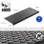 Schwarze Gummi Stufenmatte 75x25cm mit Kreis Design. Rutschfeste Outdoor Treppenmatte für sicheren Halt.