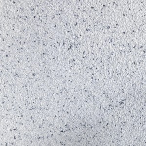 Floxxan Baumwollputz Montana 503, weiße Flüssigtapete mit Anthrazit-Punkten.