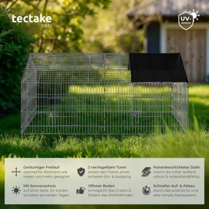 Schwarzes Tectake Freilaufgehege für Kaninchen mit Sonnenschutz im Garten.