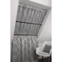 Gardinia Spannstange, schwarz, 90-140 cm mit grauem Vorhang im Dachfenster.