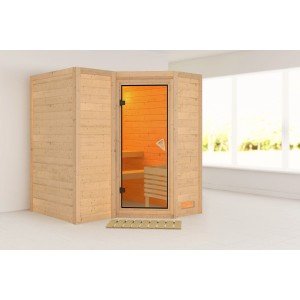 Woodfeeling Sauna Steena 1 mit Eckeinstieg, naturbelassen, aus Fichtenholz mit Glastür.