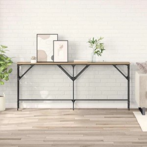 Langer vidaXL Konsolentisch Artisan-Eiche aus mattem Holzwerkstoff mit schwarzem Stahlrahmen, industrieller Stil, im Wohnzimmer.