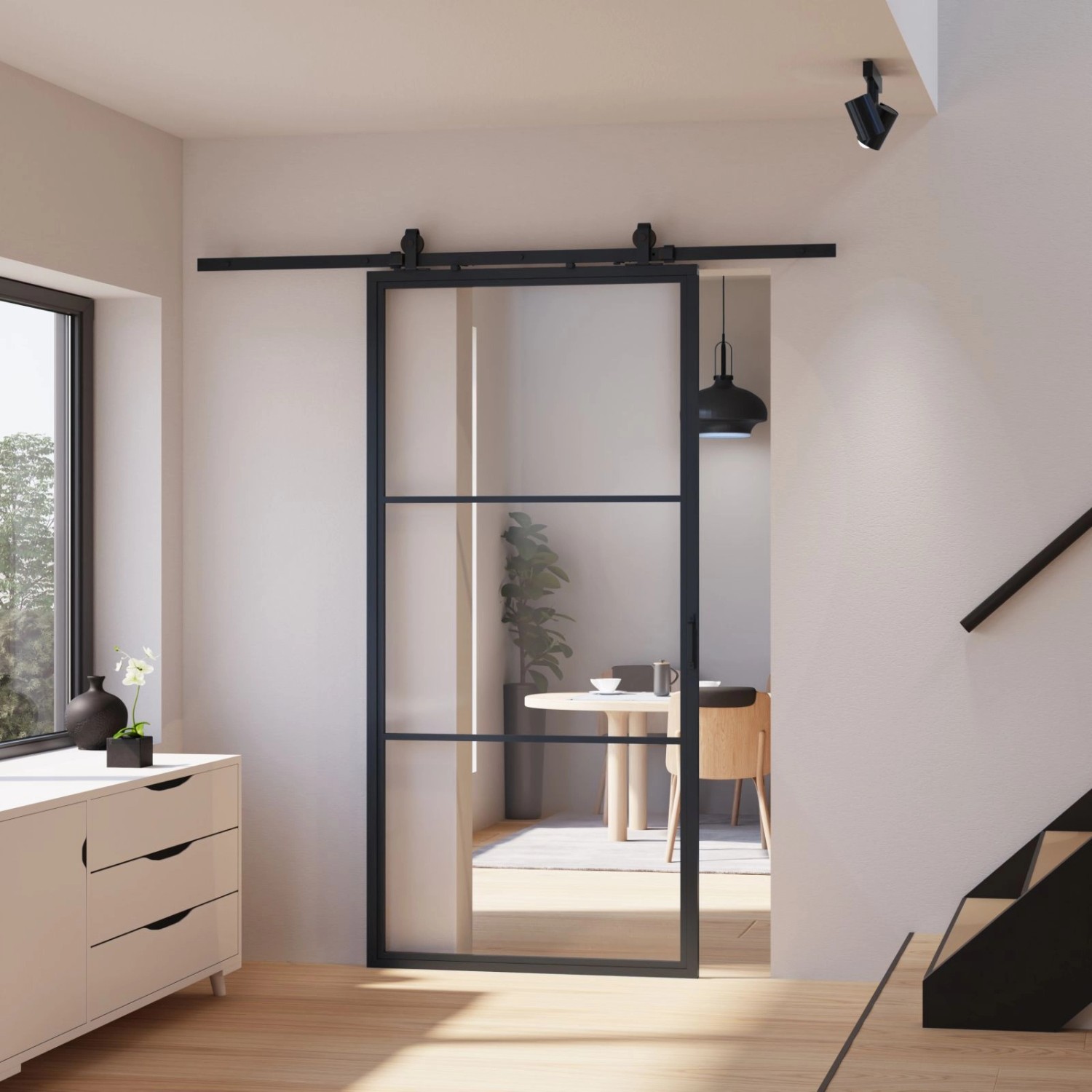 Schwarze inova Loft Glasschiebetür mit 3 Feldern, Stahlrahmen und Softclose-Funktion im modernen Wohnraum.