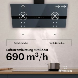 Dunkelgraue Klarstein WiFusion Dunstabzugshaube mit 690 m³/h Luftstrom. Moderne Haube über Kochfeld, zeigt Abluft- & Umluftmodus.