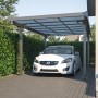 Anthrazitfarbener Floraworld Flachdach-Carport aus Aluminium mit Auto. Robuster Einzelcarport.