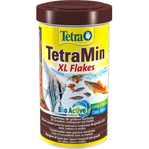 TetraMin XL Flakes 500ml: Flockenfutter für große Zierfische im gelben Behälter.