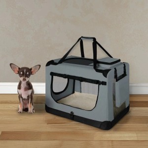 Juskys Faltbare Hundetransportbox Lassie S, dunkelgrau, mit kleinem Hund davor.