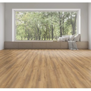 Heller Raum mit Kaindl Laminat 8,5 mm Eiche Creme Boden. Gemütliche Atmosphäre mit Fensterblick ins Grüne.