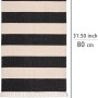 Wenko Badematte Kasi, 50x80 cm, aus recycelter Baumwolle mit schwarzen Streifen und Fransen.