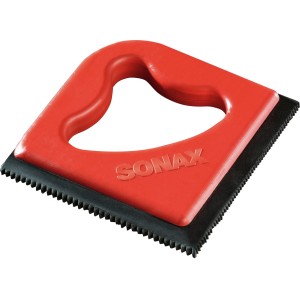 Sonax Tierhaar-Entferner mit rotem Griff und schwarzen Gummilippen.