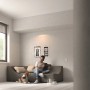 Wohnzimmer mit Philips Hue LED Einbauspot Milliskin, der eine gemütliche Atmosphäre schafft.