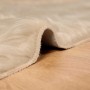 Detailaufnahme: Beiger vidaXL Kunstschaffell Teppich Tafalla (80x250 cm) auf Holzboden.