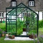 Halls Gewächshaus Popular 86, grünes Garten-Gewächshaus mit Pflanzen und geöffneter Tür.