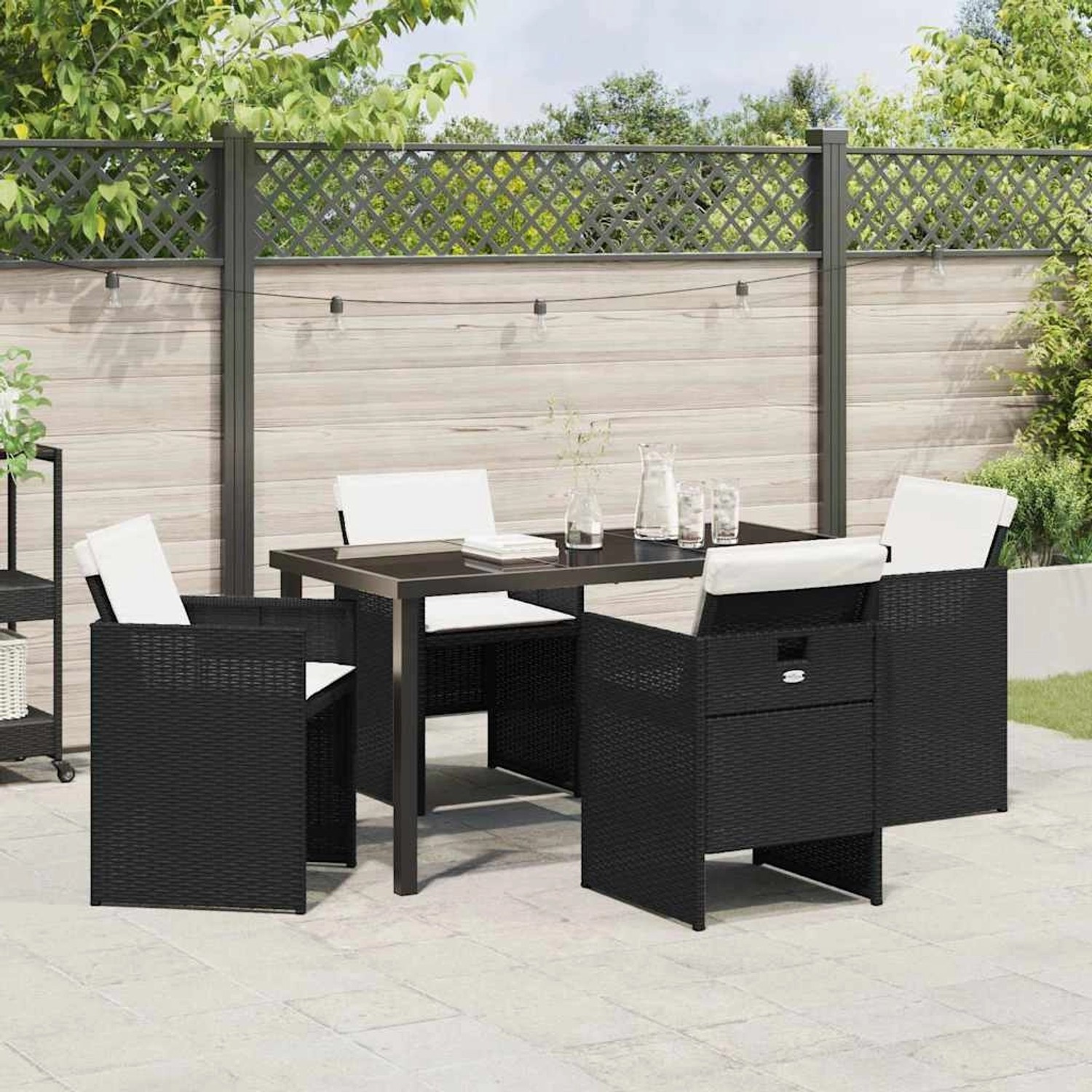 Schwarze vidaXL Garten Essgruppe, 5-teilig, aus Poly Rattan mit Tisch und 4 Stühlen.