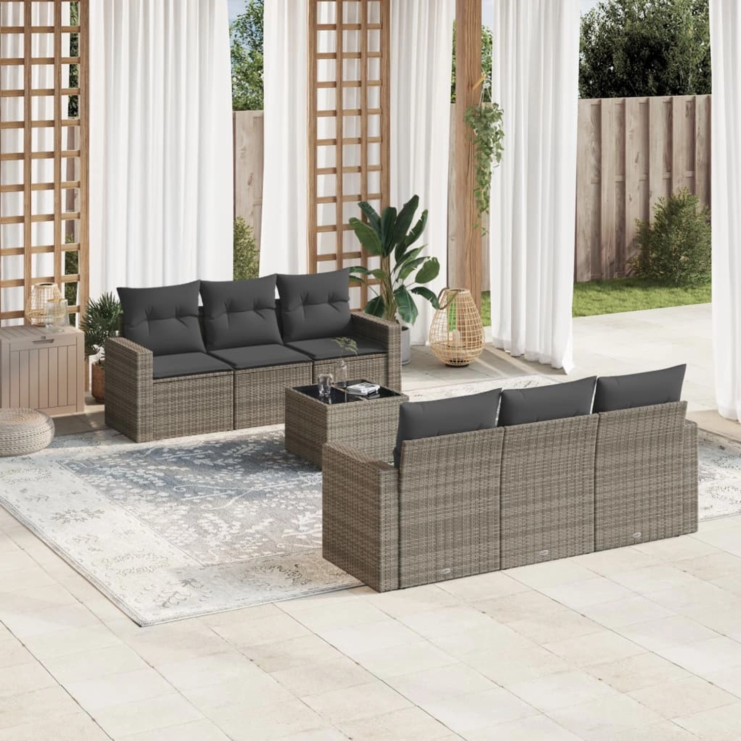 Graue 7-tlg. vidaXL Garten-Sofagarnitur aus Polyrattan mit Kissen auf Terrasse.