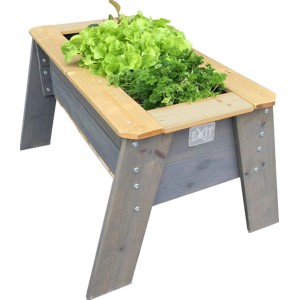 EXIT Aksent Hochbeet L aus Holz, befüllt mit Salat und Kräutern.