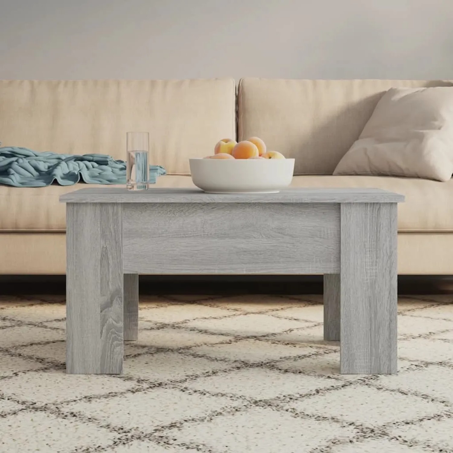 Grauer Couchtisch Sonoma 79x49 cm aus Holzwerkstoff im Wohnzimmer.