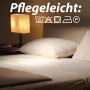 Bestlivings Kopfkissen 2er-Pack (40x80 cm) auf einem Bett mit Nachttischlampe.