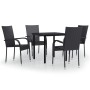 Schwarze 5-tlg. Garten-Essgruppe: Tisch mit Glasplatte und 4 Rattan-Stühle.