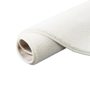 Gerollter, runder, creme-farbener Hochflor Teppich (200x200cm) aus der Serie Touch.