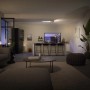 Moderne Philips Hue Centris LED-Deckenleuchte mit 3 Spots in Weiß im Wohnraum.