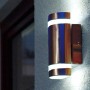 Moderne 2-flammige Außenwandleuchte Focus aus Edelstahl für indirekte Beleuchtung.