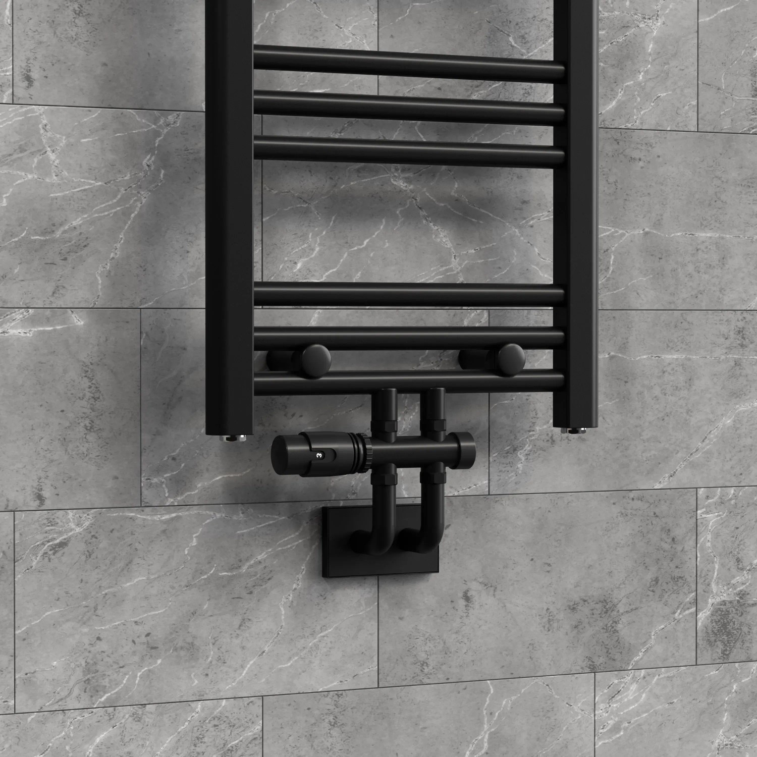 Schwarze LuxeBath Anschlussgarnitur für Badheizkörper mit Mittelanschluss in Durchgangsform.