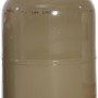 Gefüllte 11 kg WestfalenGas Propan Nutzungsflasche in Beige mit roter Ventilkappe.