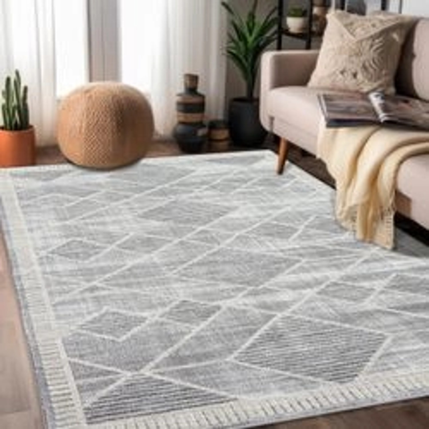 Grauer Hochflor-Teppich Esso 200x290 cm mit geometrischem Muster für Wohnzimmer.