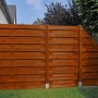 Sichtschutzzaun Goch, teakfarben lasiert, 180x180 cm, Holzzaun Element für Garten und Terrasse.