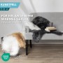 Flauschiges KARAT Kunstfell Nelly in Charcoal Grey und anderen Farben auf einem Sofa.