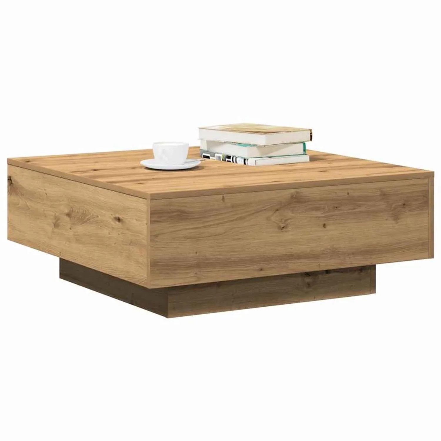 Moderner quadratischer Couchtisch in Artisan-Eiche Optik aus Holzwerkstoff, mit Tasse und Büchern.