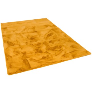 Pergamon Luxus Fellteppich Plush Curry, 120x170cm. Weicher Kunstfellteppich in Currygelb.