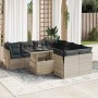 Hellgraue 9-tlg. Garten-Sofagarnitur aus Poly Rattan mit Tisch und dunklen Kissen.