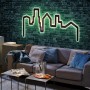 Paulmann FlexLED 3D Basis-Set als grüne Skyline Leuchtschrift an Ziegelwand.