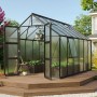 Schwarzes Vitavia Gewächshaus Olymp 9900 (9,9 m²) mit geöffneter Doppeltür und Fundamentrahmen im Garten.