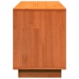Wachsbrauner Schuhschrank aus massivem Kiefernholz, Seitenansicht. Robuste Schuhkommode mit Holzmaserung.