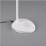 Weiße Reality LED-Touch-Tischlampe Load mit induktiver Ladestation für Smartphones.