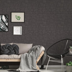 Anthrazitfarbene Vliestapete mit Steinmuster in dunkler Optik für Wohn- und Schlafzimmer.