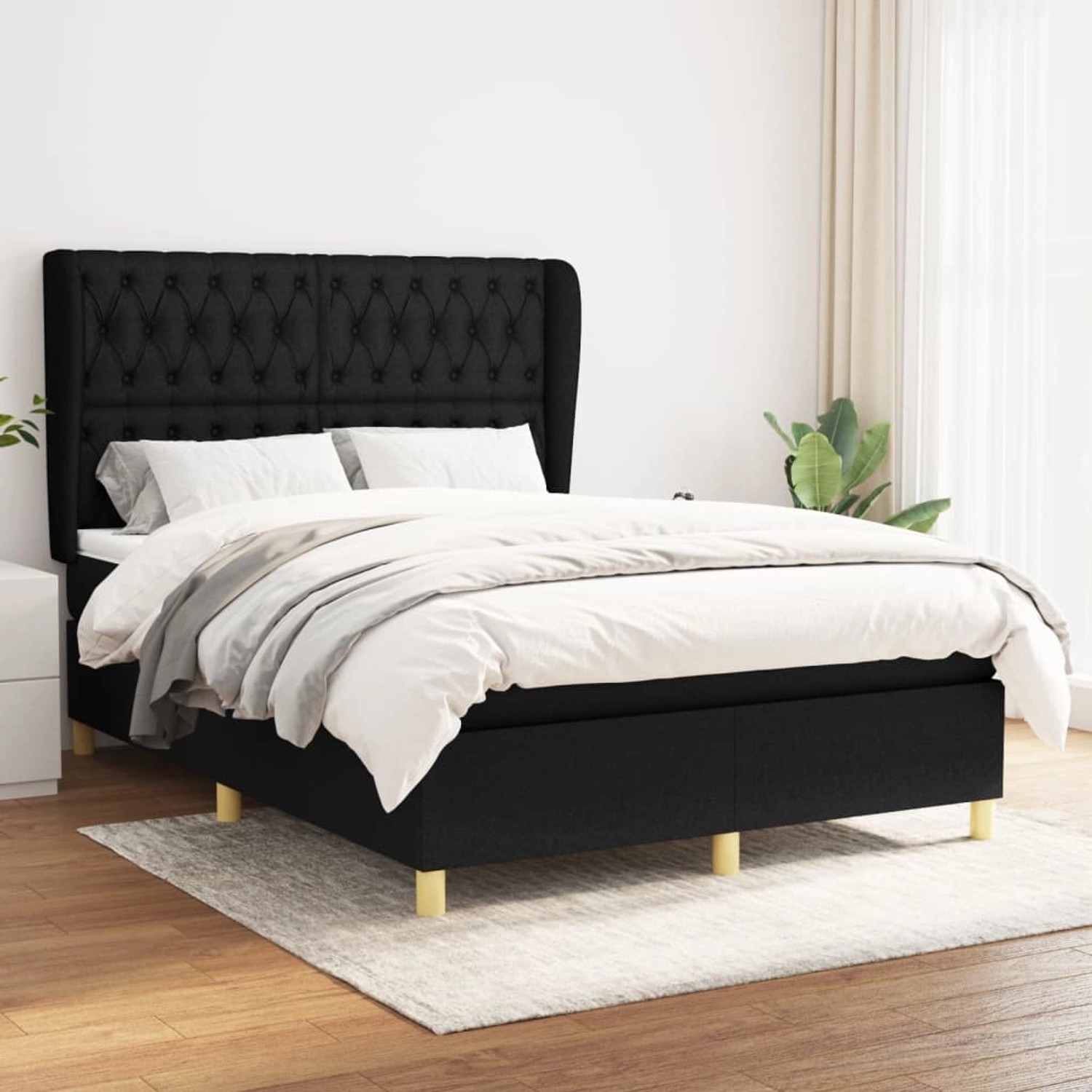 Schwarzes vidaXL Boxspringbett (140x190 cm) mit Stoffbezug, inklusive Matratze und Kopfteil.