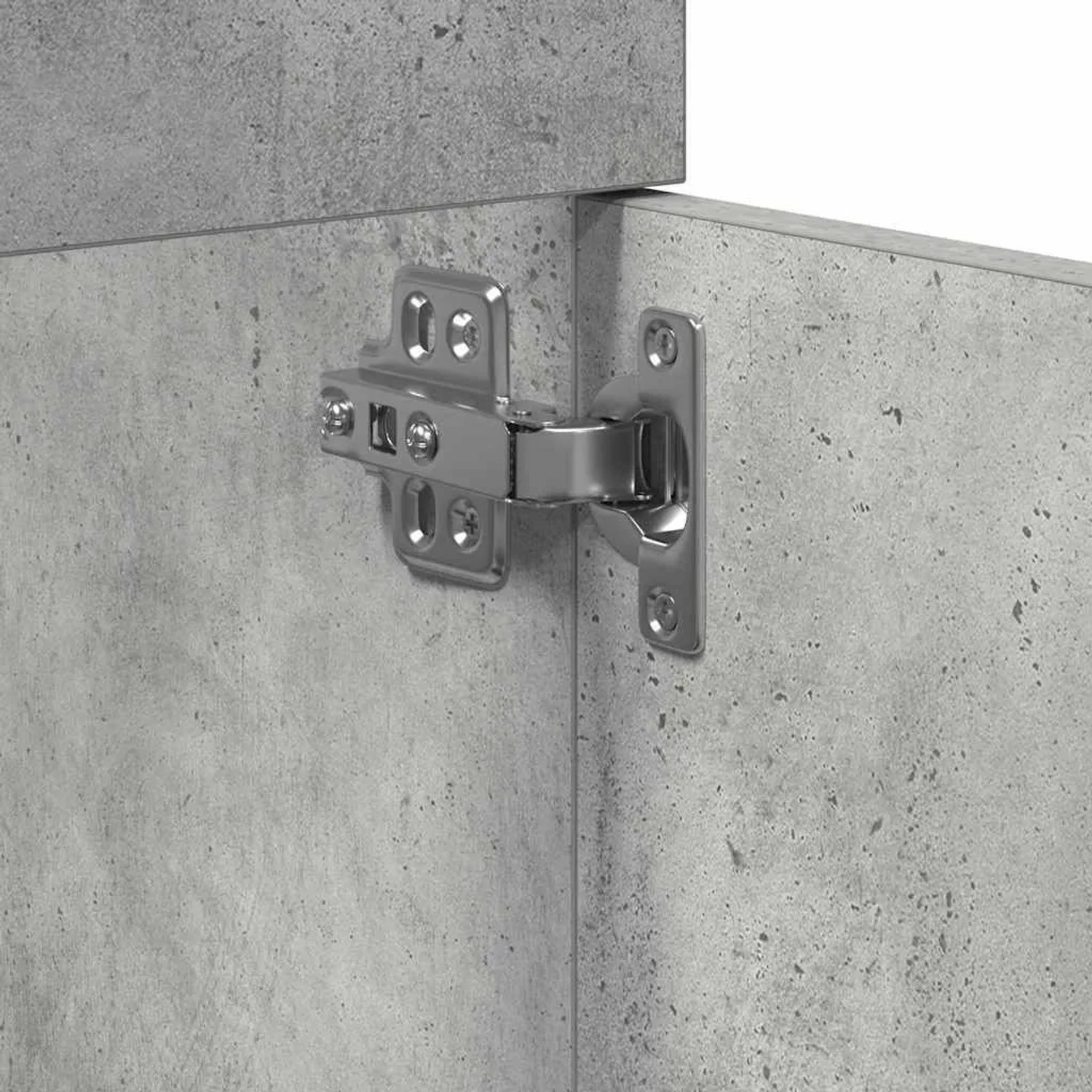 Detailaufnahme: Betongrauer Waschbeckenschrank mit Scharnier.