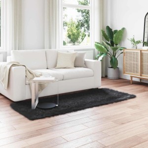 Schwarzer vidaXL Kunstschaffell Teppich Tafalla, 100x200 cm, aus Polyester im Wohnzimmer.