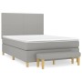 Hellgraues Boxspringbett 140x190 cm mit Matratze und Bank, Stoffbezug.