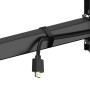 Detailaufnahme der Hama TV-Wandhalterung mit Kabelmanager und HDMI-Kabel.