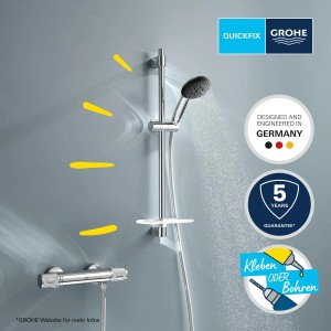 Grohe Precision Feel Brausegarnitur mit Thermostat und Handbrause im Duschbereich.