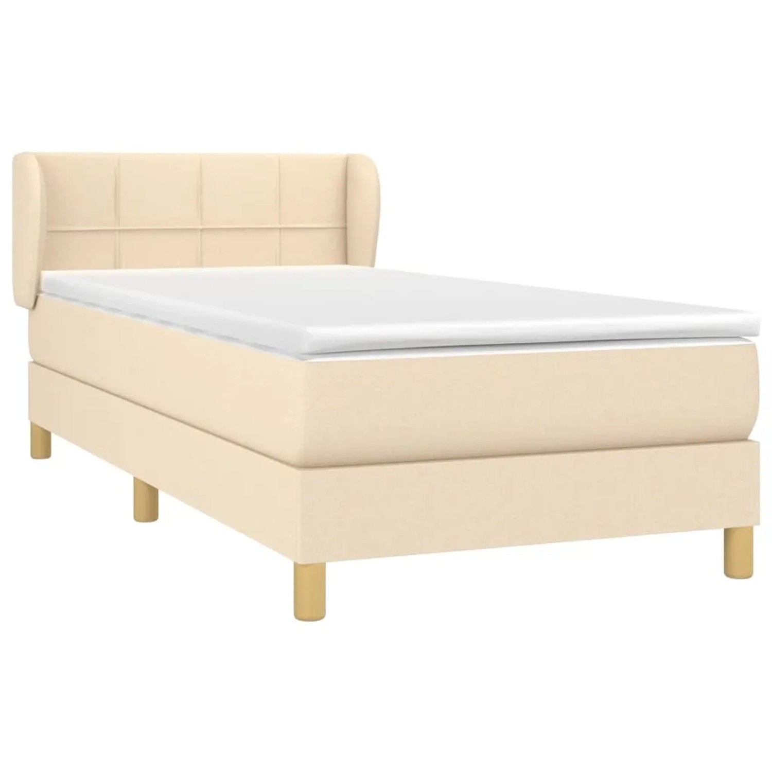 Cremefarbenes Boxspringbett 100x200 cm mit Matratze und Kopfteil.